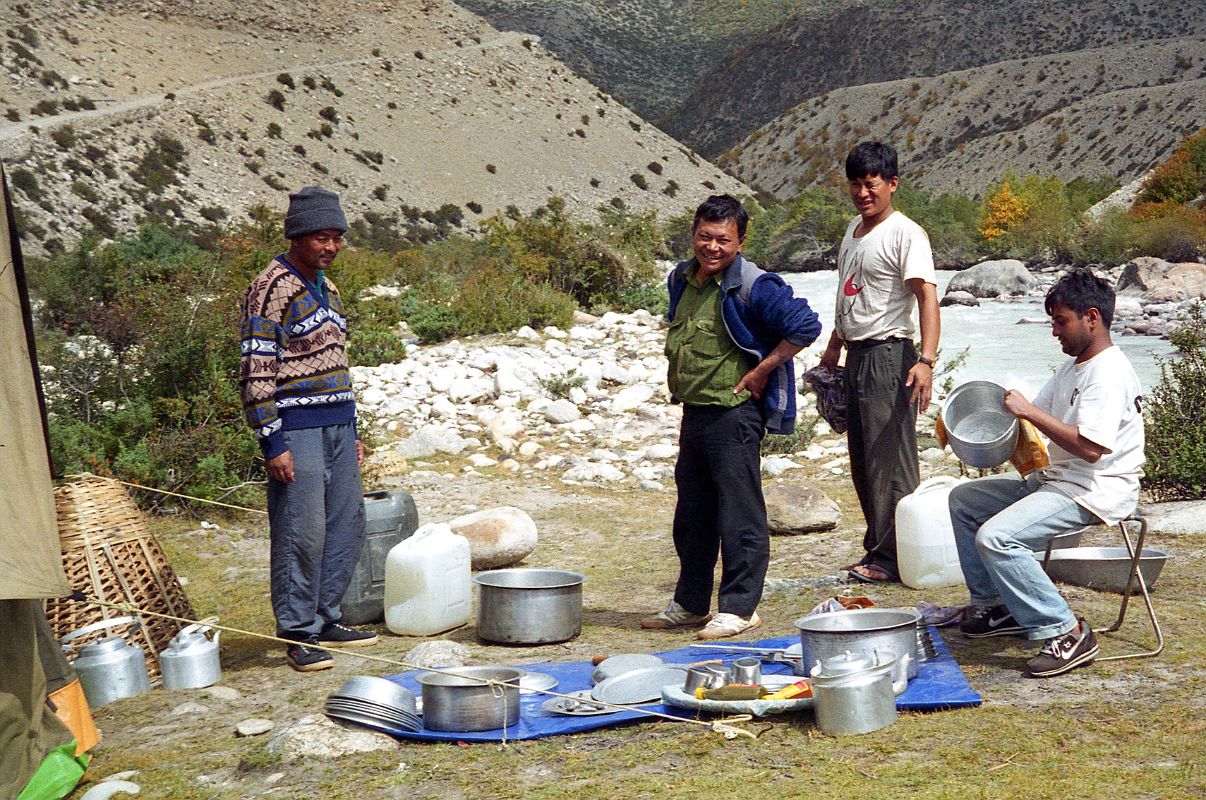 04 Our Crew Cleaning Our Dinner Dishes At Kharta Tibet